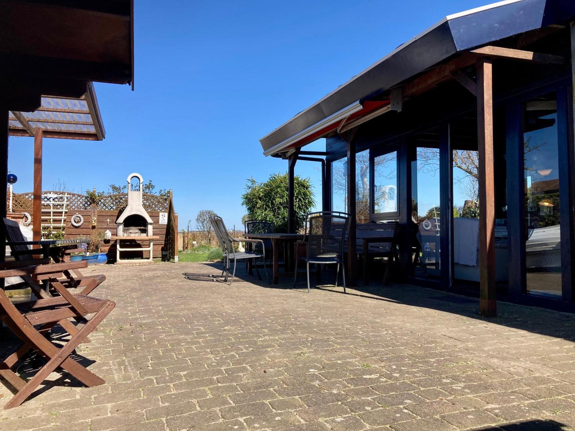 House Marijke With Winter Garden And Direct Access To The Lauwersmeer Anjum Esterno foto